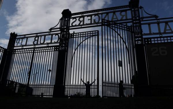 Over The Wall- Bold Ibrox fan looks on at Castore photo-shoot