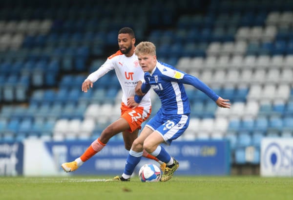 Gillingham’s Steve Evans says Celtic are “delighted” with Scott Robertson’s progress