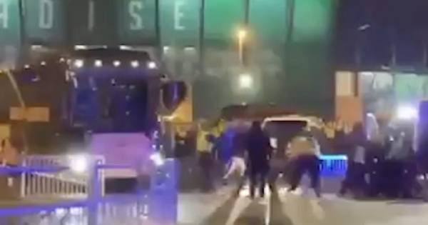 Celtic team bus comes under attack as police forced into action