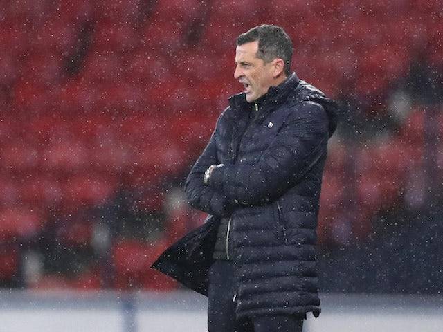 Hibernian manager Jack Ross pours cold water over Celtic links