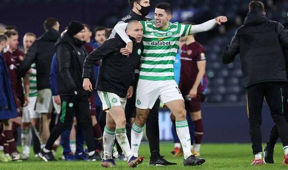 Scott Brown held back by Celtic kit man after Steven Naismith clash in Scottish Cup final