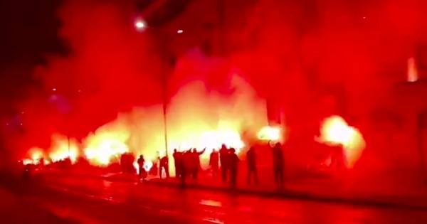 Rangers fans celebrate Celtic defeat outside Ibrox with pyro party