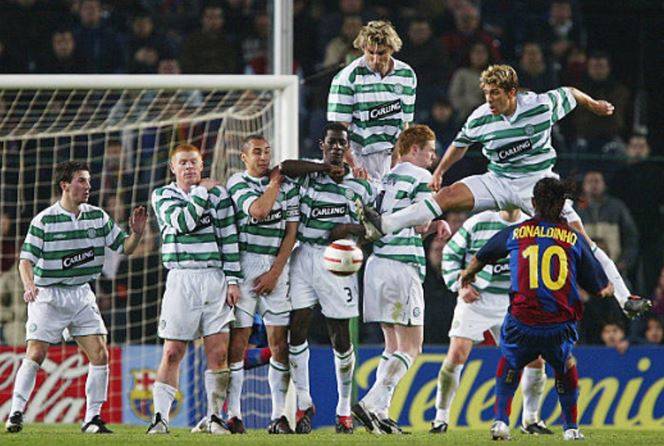 Photo of the day: Two Stans Leap As Ronaldinho Strikes A Free Kick (2004)