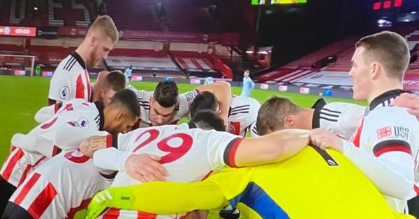 Oli McBurnie and John Fleck want no part of Sheffield United huddle