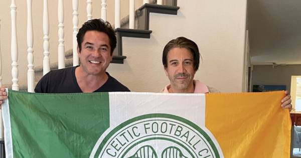 Superman actor Dean Cain is pictured holding a Celtic flag