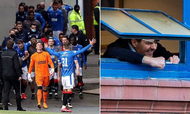 Rangers players run to corner of Ibrox to celebrate with fans who have flouted lockdown rules