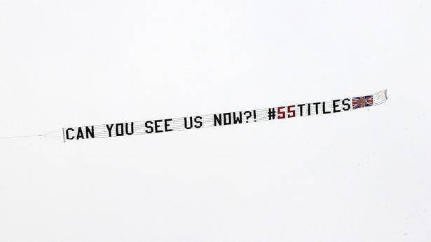 Rangers fans fly plane banner over Celtic’s match as smoke bombs halt game