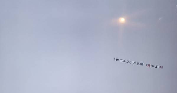 Rangers fans troll Celtic with ‘can you see us now’ banner flying over Tannadice