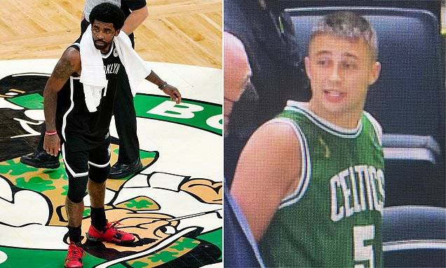 Celtics fan, 21, is charged with assault and battery after throwing bottle at Kyrie Irving