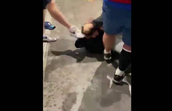 Video: English kick and bash Asian man on the ground in Wembley shame