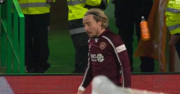 Barrie McKay struck by bottle from Celtic Park home end as Hearts star takes corner