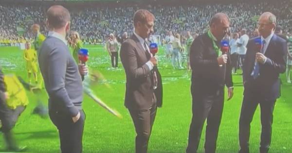 Celtic fan wiped out by steward as pitch invader gatecrashes Ange Postecoglou interview live on air