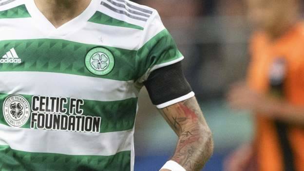 Celtic fined by Uefa for fans’ anti-monarchy banner in Warsaw