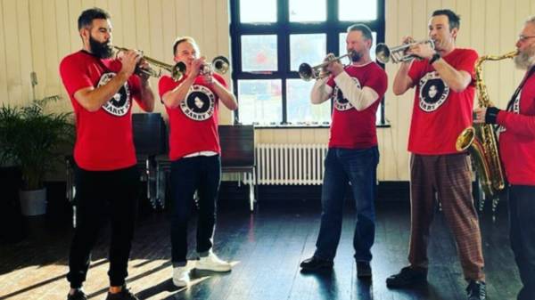 Celtic legend unrecognisable as he’s spotted playing the trumpet in a band on TV show after shock career change