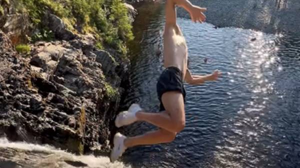 Watch moment daredevil Celtic star shows off acrobatic skills with insane CLIFF DIVE