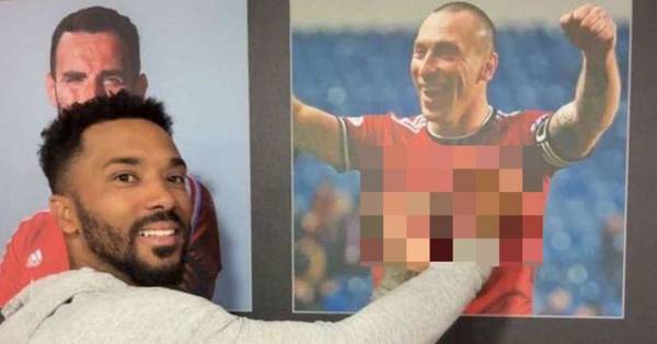 Shay Logan relights Celtic Scott Brown rivalry as ex Aberdeen star gives the middle finger