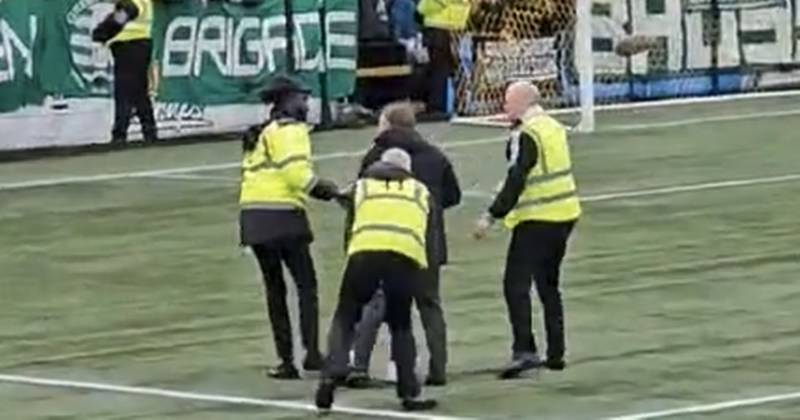 Brendan Rodgers makes Celtic fan’s day as he rescues young pitch invader from security staff