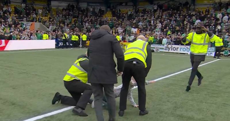 Brendan Rodgers rushes to push steward off young Celtic fan who got tackled to floor