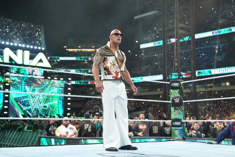 Retro Celtic represented as The Rock poses with Bhoys fans who helped him get ready for Wrestlemania 40