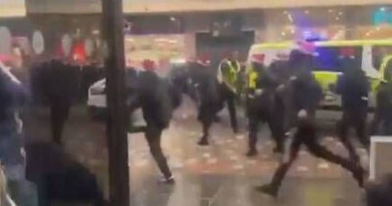 Moment horrified shoppers flee as Celtic and Rangers fans clash