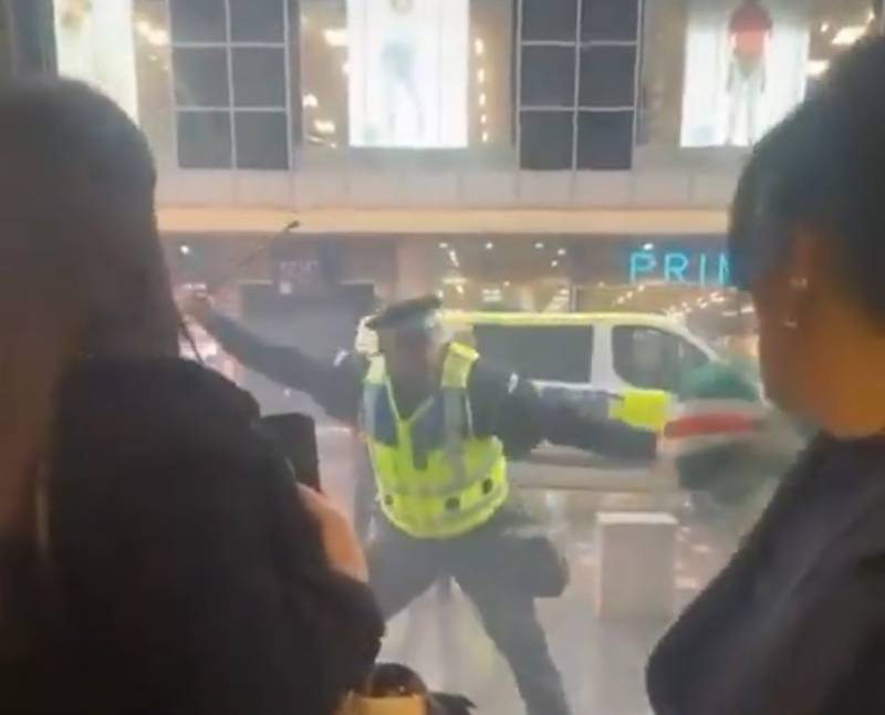 Rangers and Celtic ultras clash with police as shoppers cower in doorway