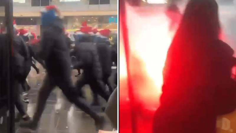 Shock moment Celtic & Rangers ultras clash as terrified Christmas shoppers left petrified by pyro in doorway