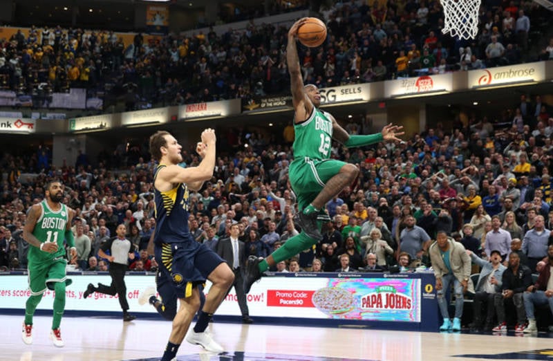 Steal and dunk in dying seconds ensures Celtics quash comeback and edge Pacers