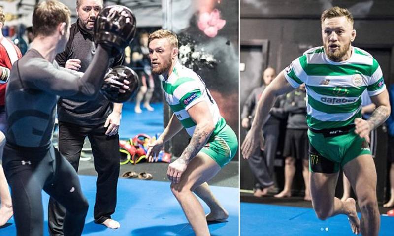 Conor McGregor dons Celtic shirt during training