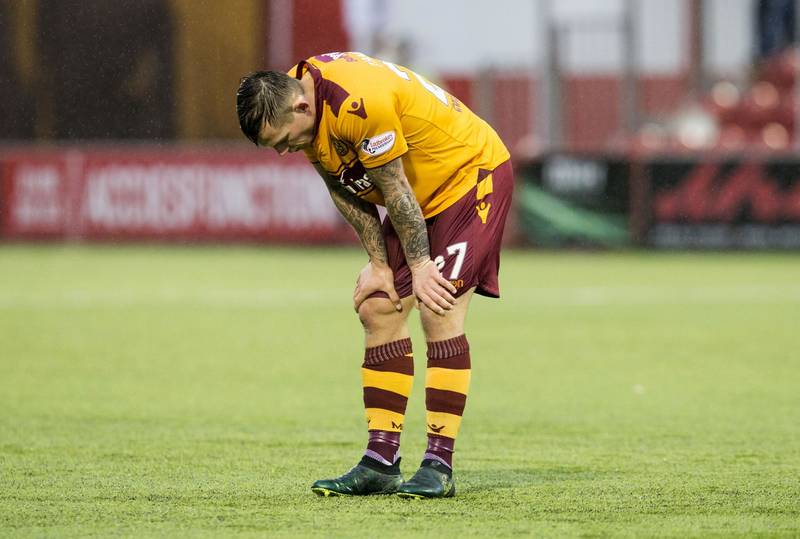 Stephen Robinson urges Motherwell players to stun Celtic for stricken teammate Craig Tanner