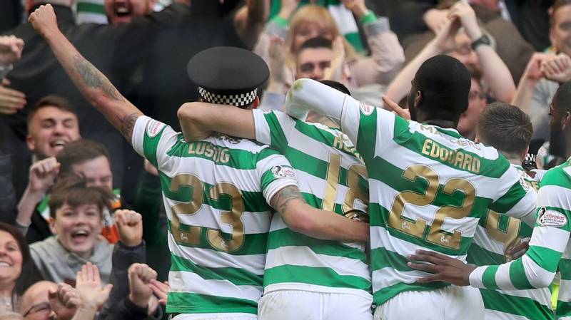 Celtic’s Mikael Lustig pinches policeman’s hat after win vs. Rangers