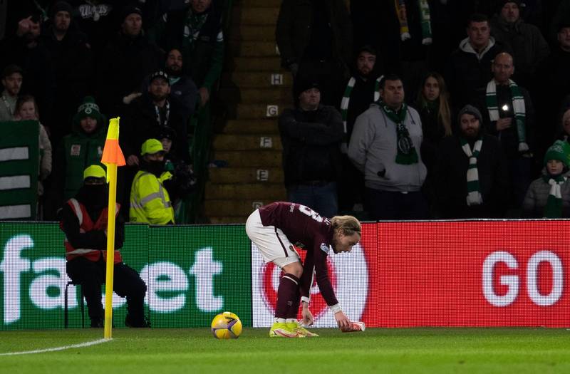 Hearts star Barrie McKay pelted by objects at Parkhead as Celtic fans continue Bernard Higgins protest