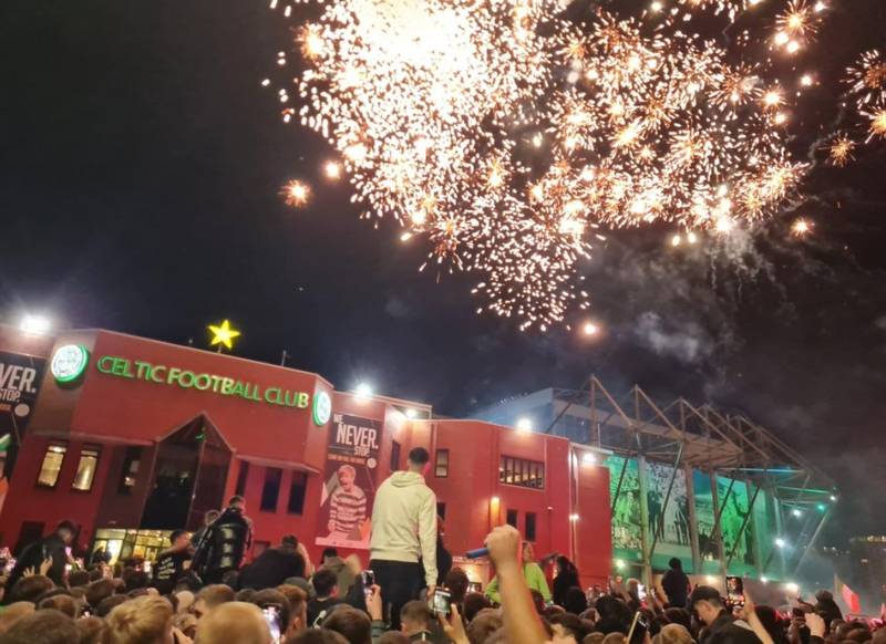 Celtic fans ‘do The Huddle’ as they celebrate title win outside Celtic Park