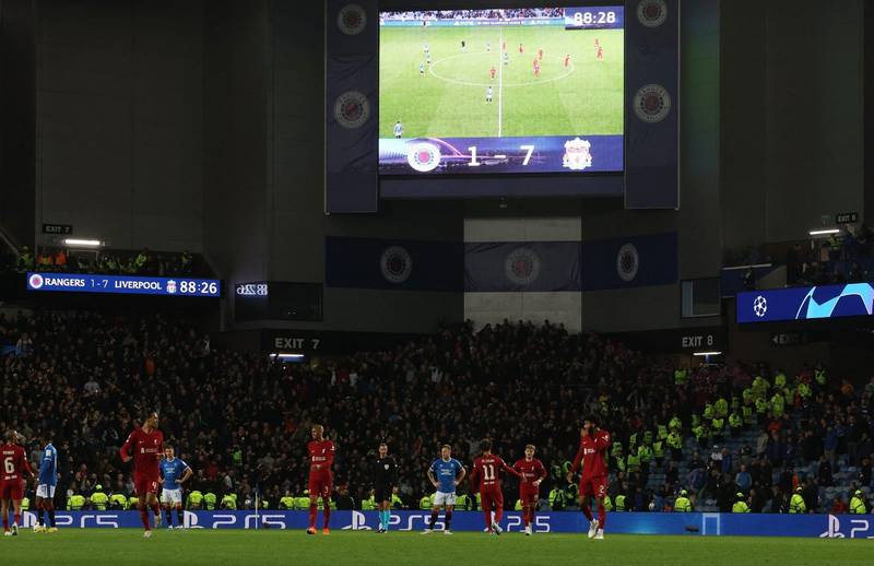 Undercover- Ibrox partnership chief celebrates 7-1 pumping with his Liverpool mates!