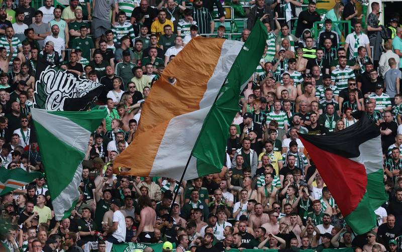 Behind Enemy Lines- Watch video of Celtic fan flying the flag inside Tynecastle