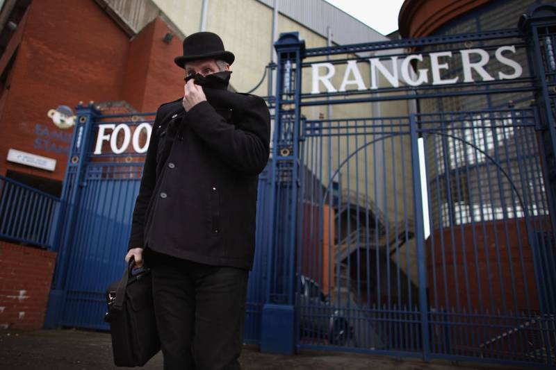 The Rangers issue more confetti shares as the lights flicker at Ibrox